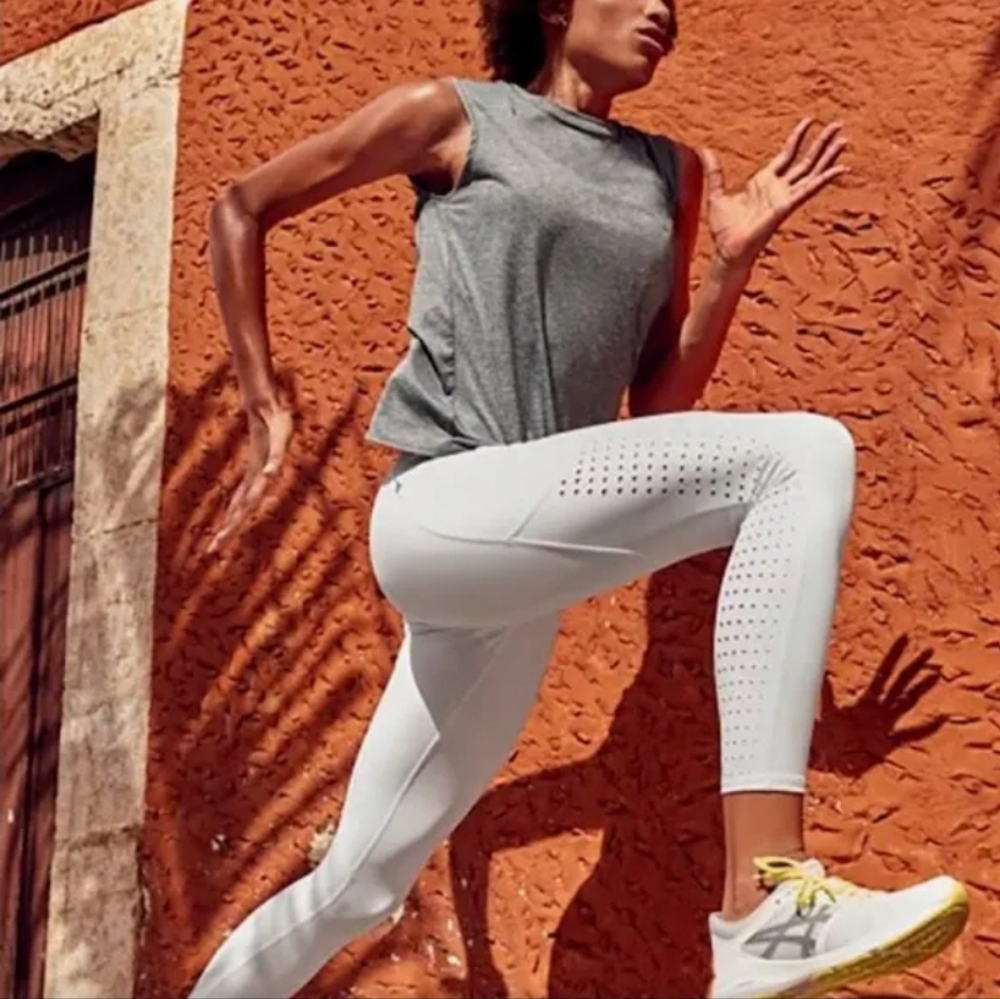 Athleta Contender Laser cut 7/8 tights M